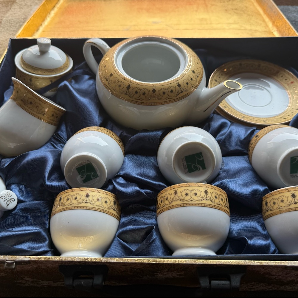 Elegant Gold and White Tea Set